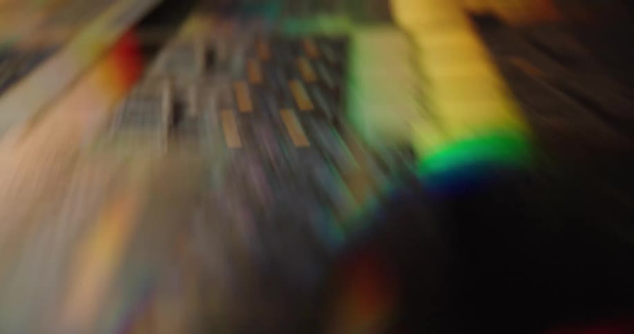 A fastpaced abstract sequence of colorful light leaks and blurred textures it creates a highenergy cinematic atmosphere through rapid motion and shifting prismatic effects