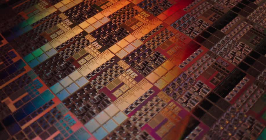 The surface of an array of microchips is reflective and colorful