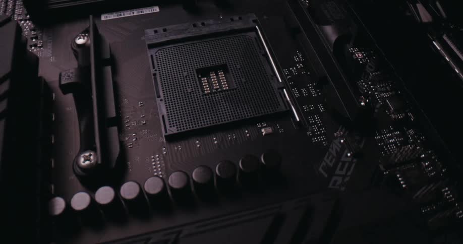 Processor socket on a motherboard with visible capacitors and electronic traces