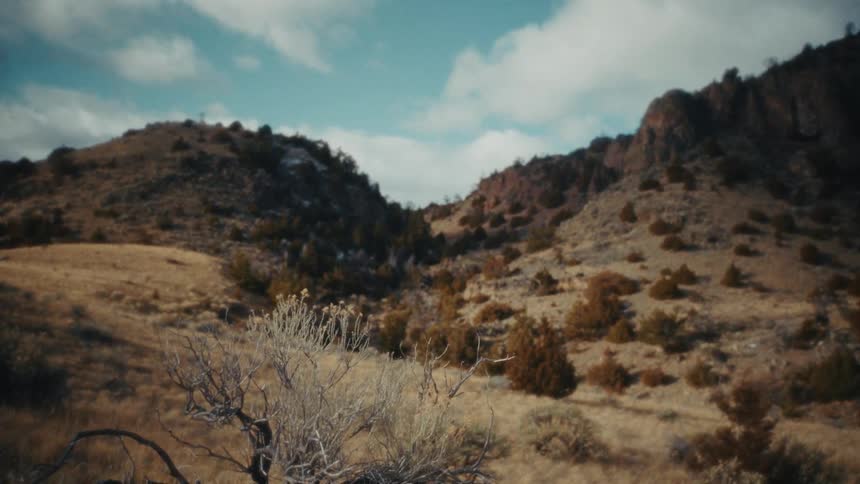 A view of some mountains in the desert