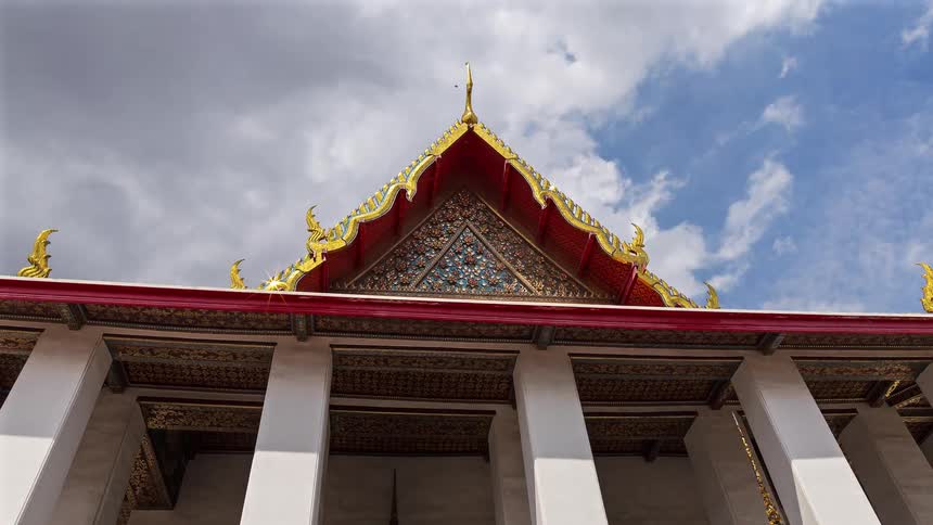 A view of a temple outdoors in a time lapse
