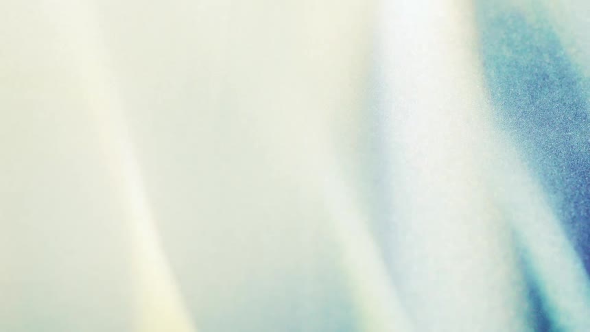 Abstract gradient in bluish and greenish tones over dark background