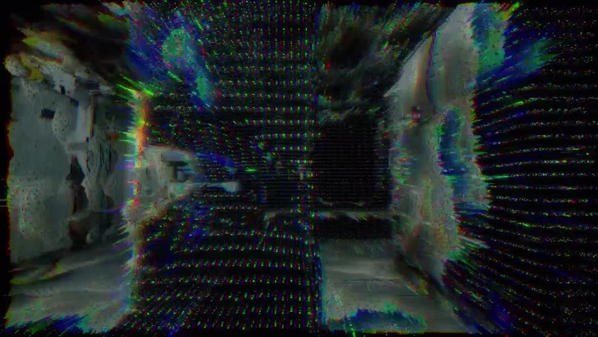 A digital environment with a glitch effect shows glowing colorful pixels and distorted geometric shapes moving through a dark corridor with industrial equipment