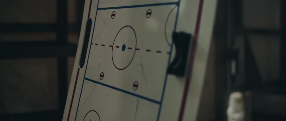 Board with a diagram on it stands in a building