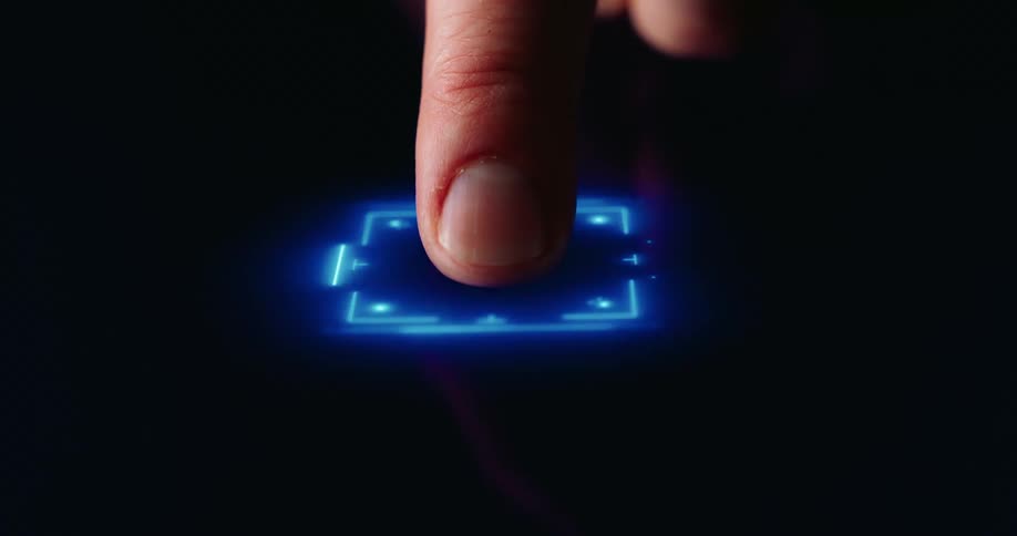 Persons finger presses down on a cyber screen as glowing digitized components emerge