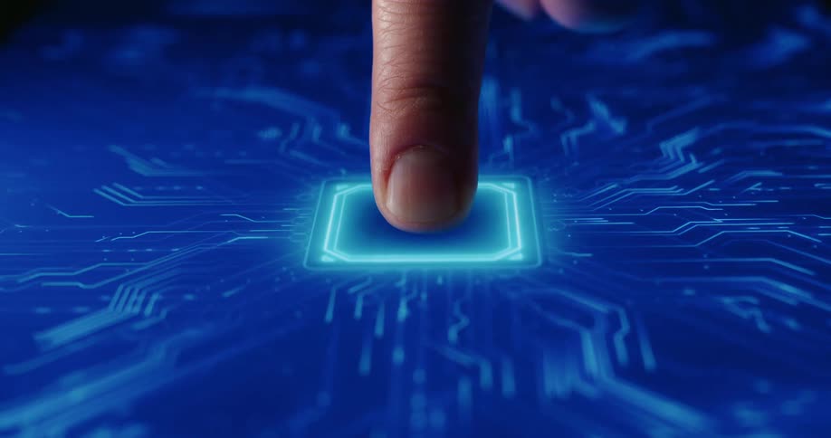 A finger touches a screen and a digital image of a microprocessor appears