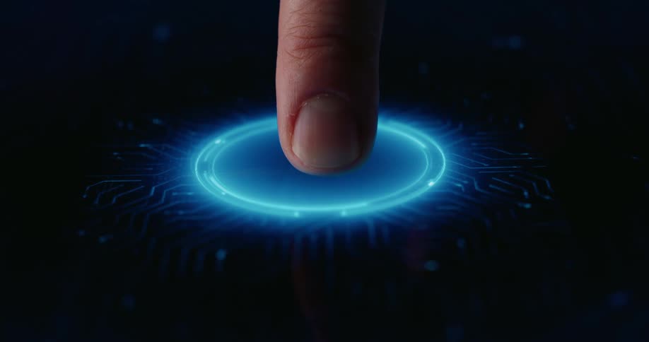 A fingertip presses down on a glowing blue circular interface embedded in a sleek futuristic digital surface
