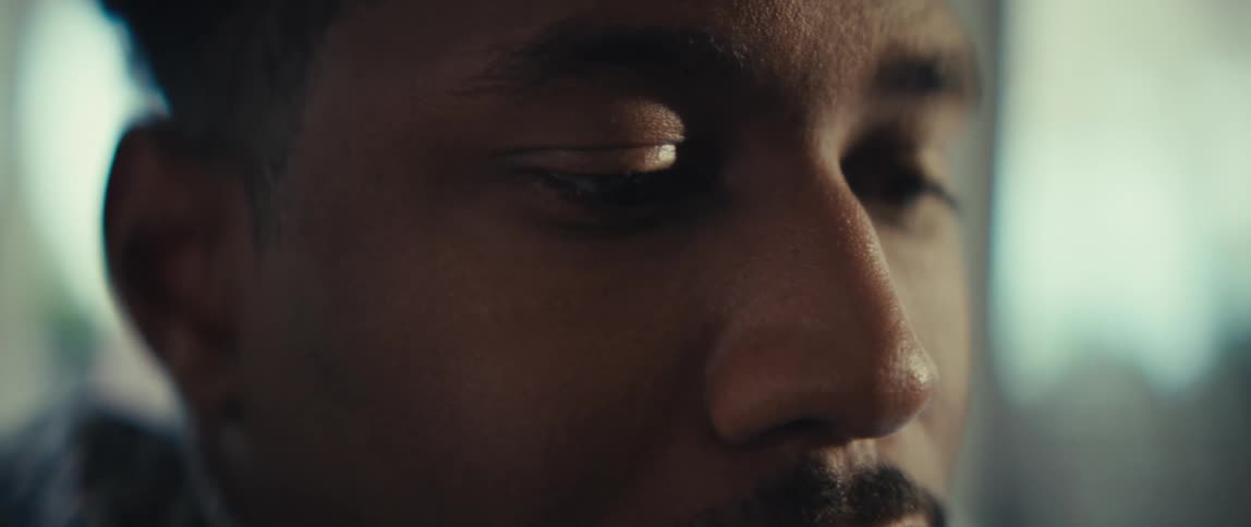 Closeup of a mans face highlighting his eyes and focused expression