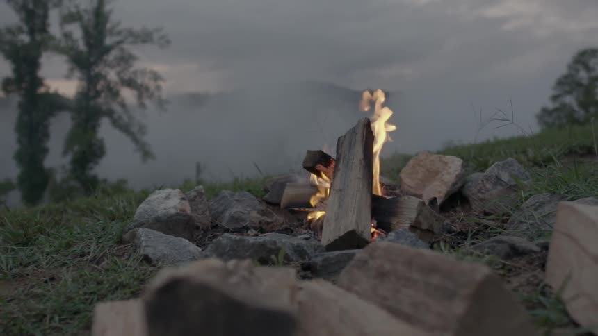 Wood burning on an outdoor fire pit