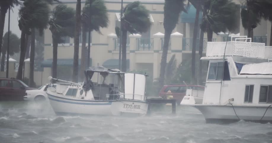 A view of some boats outdoors in a storm