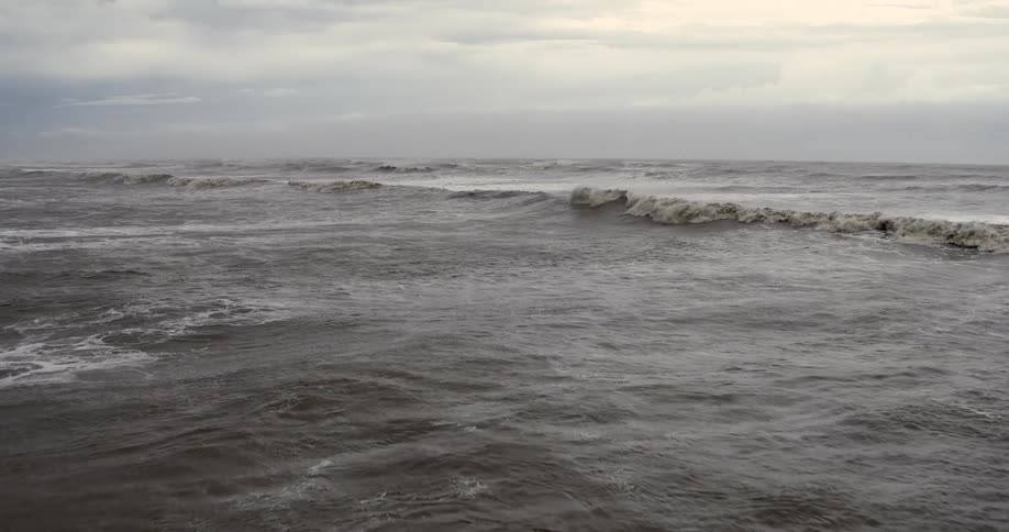 An aerial view of waves in the ocean