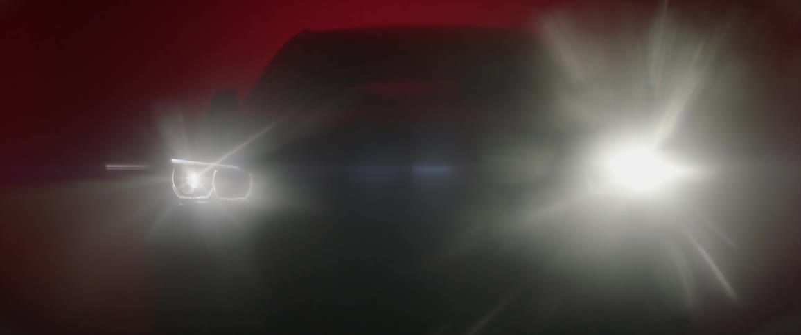 Car lights are shining on a vehicle