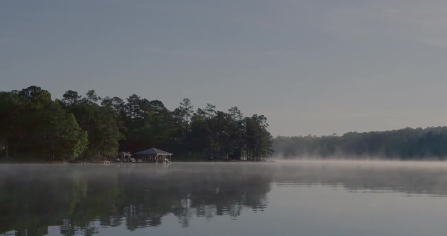 Light mist on a lake just above the water surface