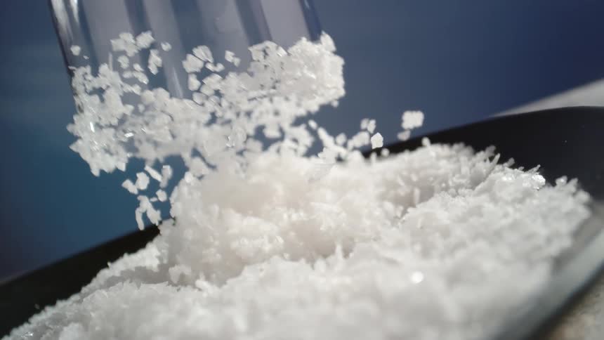 Glass being pressed onto crushed ice