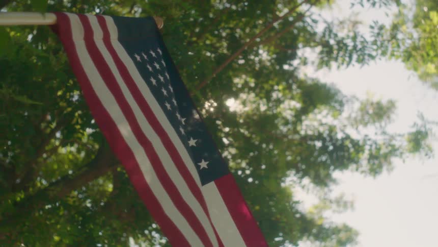 An american flag waves in the breeze
