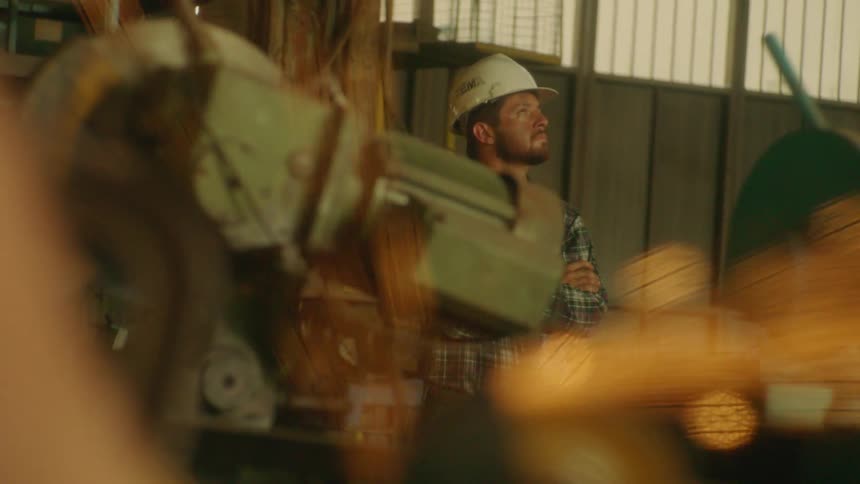 A construction worker wears a hard hat on site