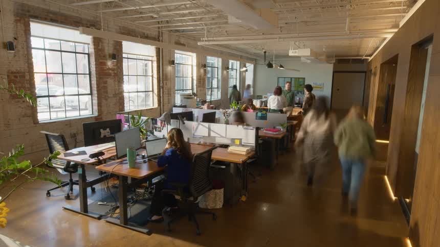 A group of people working together in an office