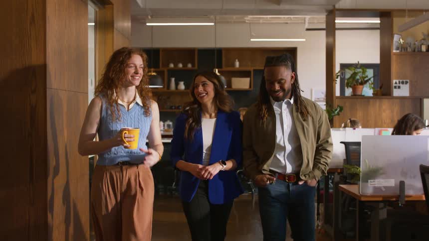 A group of people working together in an office