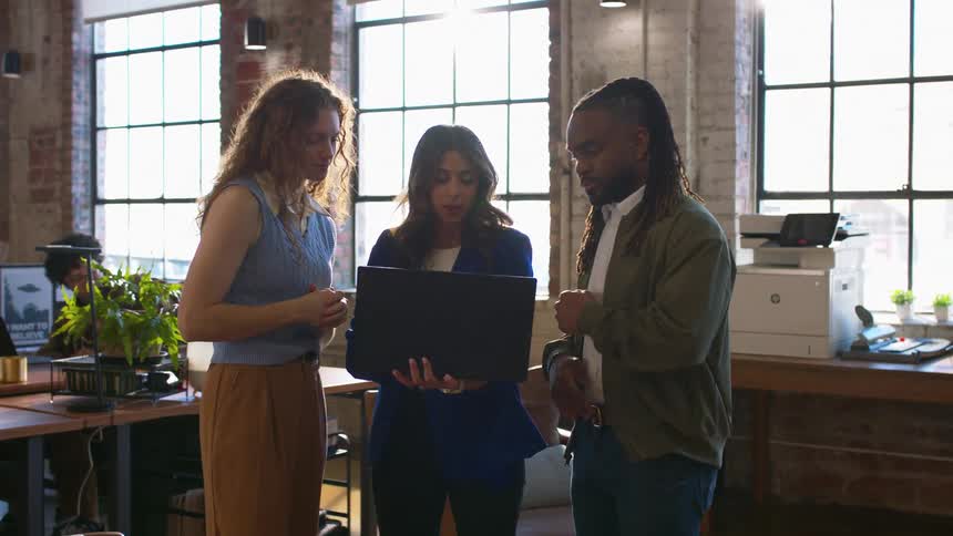 A group of workers in an office together