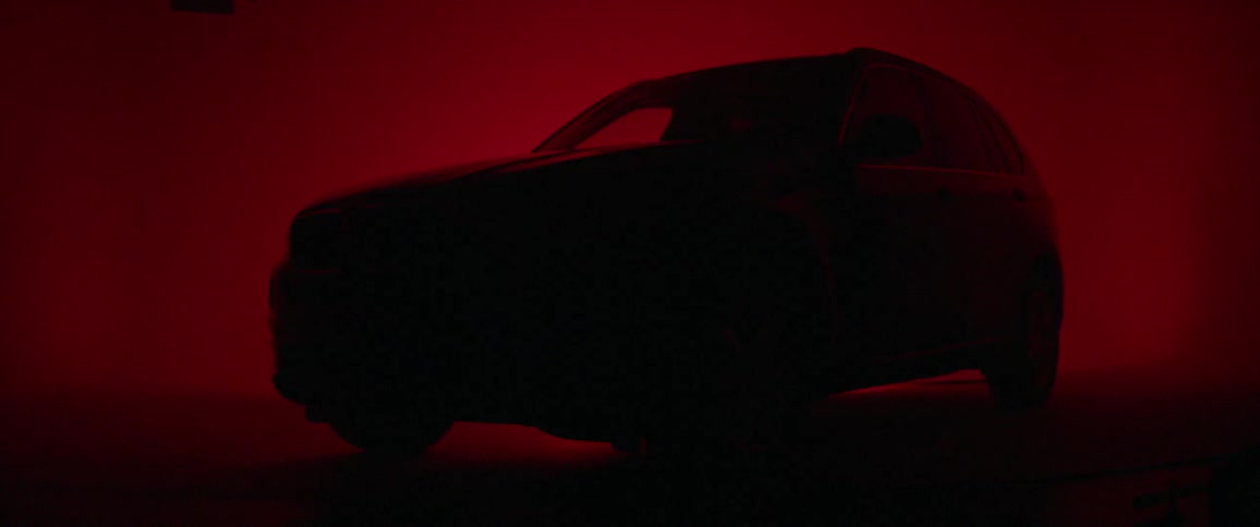 A vehicle turns its headlights on and off