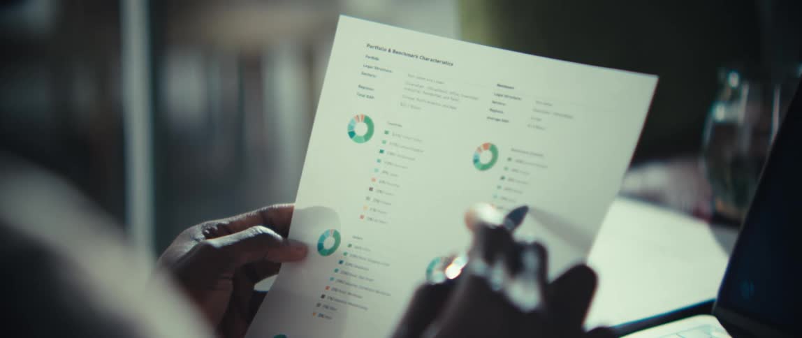 Document with sector charts and portfolio and benchmark metrics
