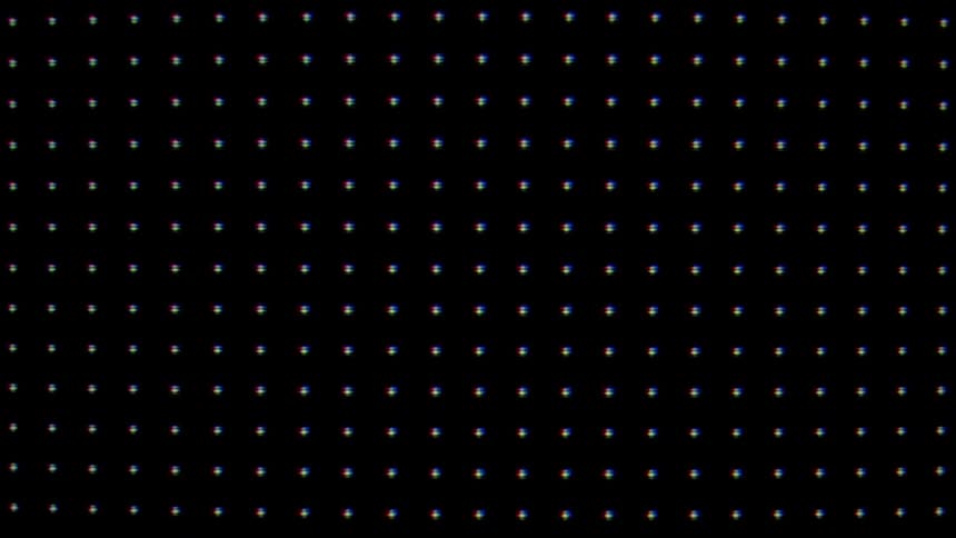 This video shows a grid of small glowing points of light against a dark background creating a digital or pixelated aesthetic the light dots subtly flicker with a slight chromatic aberration giving the impression of an electronic screen or a futuristic