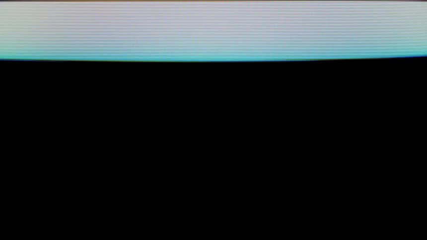 A close view of a dark screen showing a glowing white band at the top edge with fine horizontal lines and a thin blue border