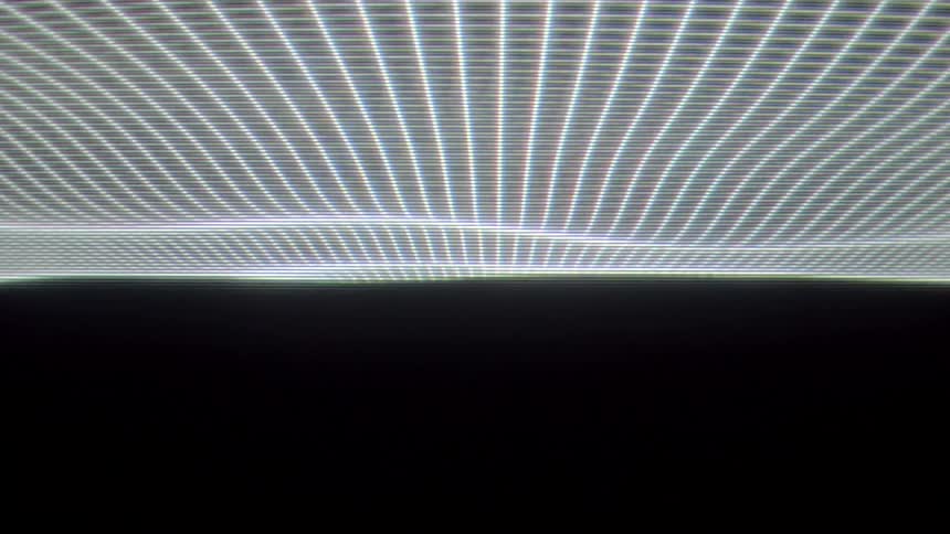 This video features a glowing white digital grid that undulates like a liquid surface against a dark background the shifting perspective and organic movement create a futuristic topographic aesthetic reminiscent of data visualization or retrosynthwave