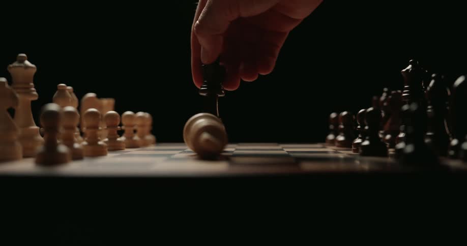 The chess piece is knocked over
