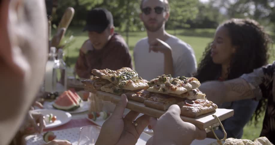 People enjoying themselves at a picnic