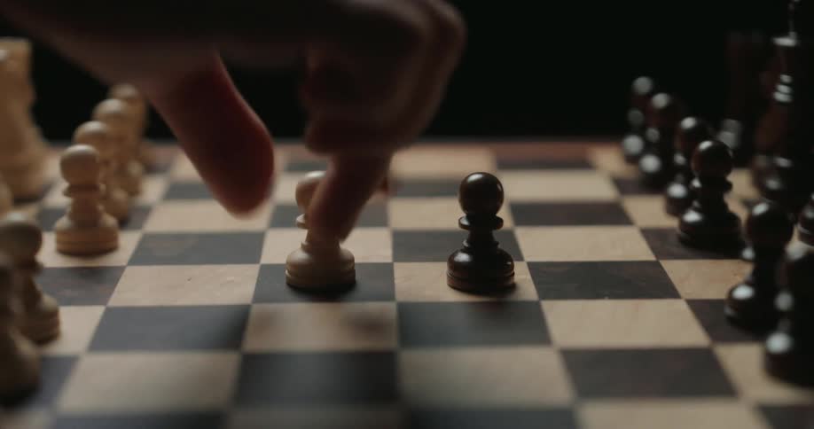 Two people playing chess