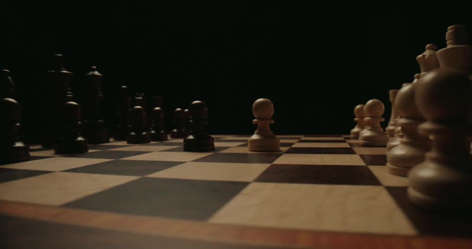 The chess piece is moved on the board