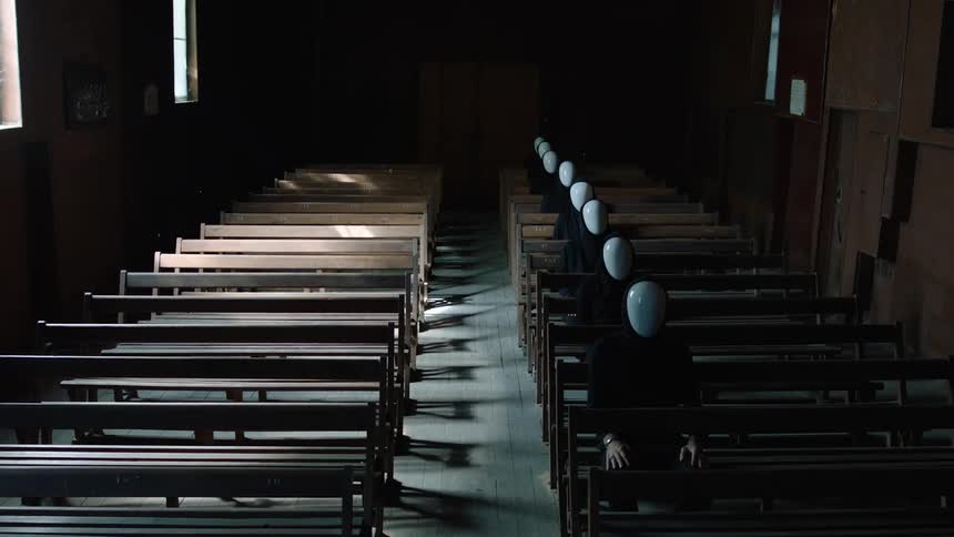 A church with people wearing masks