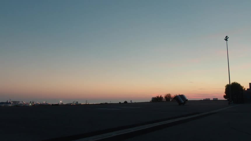 A view of a landscape at sunset
