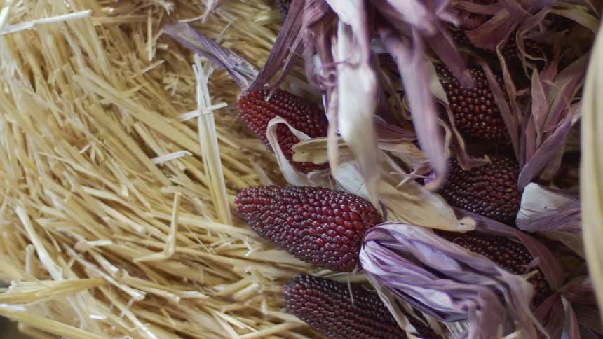 Dark grainy vegetables in a straw basket