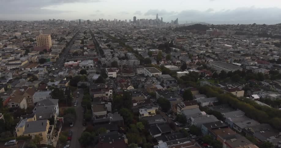 Aerial view of a large city on a cloudy day