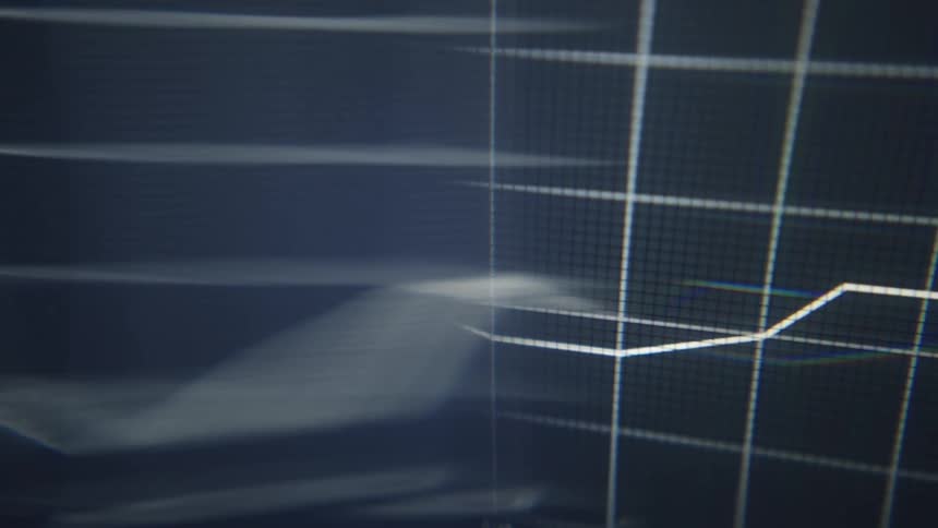 Grid and white lines displayed on a screen with blur effect