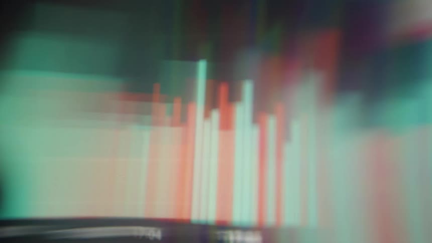 A close up of some green and red animation graphs