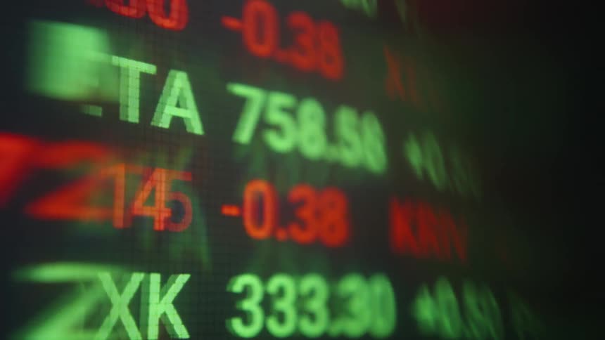 The video features a closeup cinematic shot of a digital stock market ticker displaying fluctuating financial data green and red numbers scroll across the screen highlighting various stock symbols and their realtime price changes