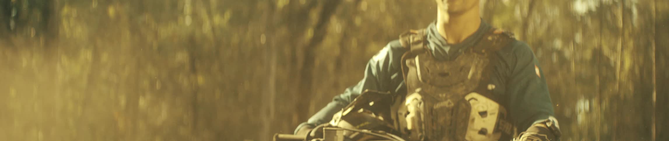A portrait of a man on a dirtbike