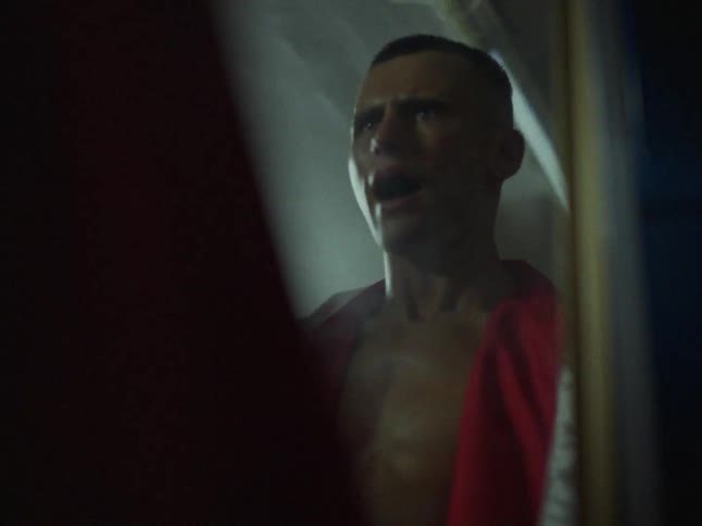 A boxer training in a mirror