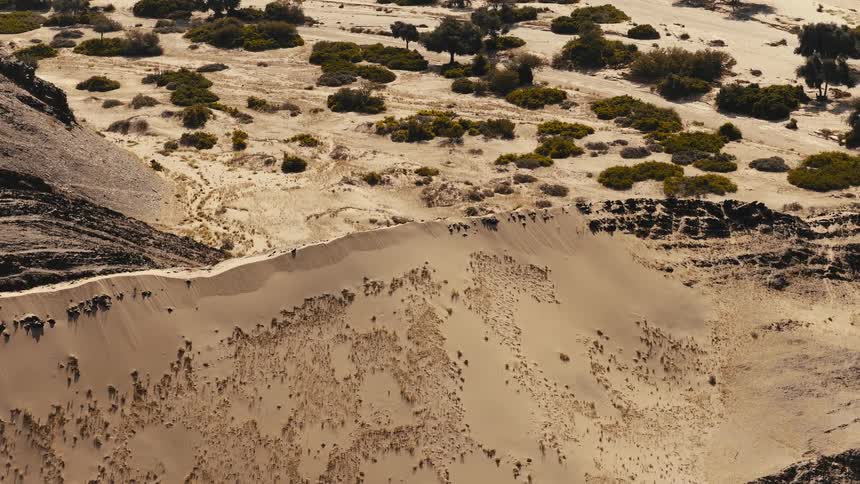 Aerial view of a sand dune ridge in a desert landscape