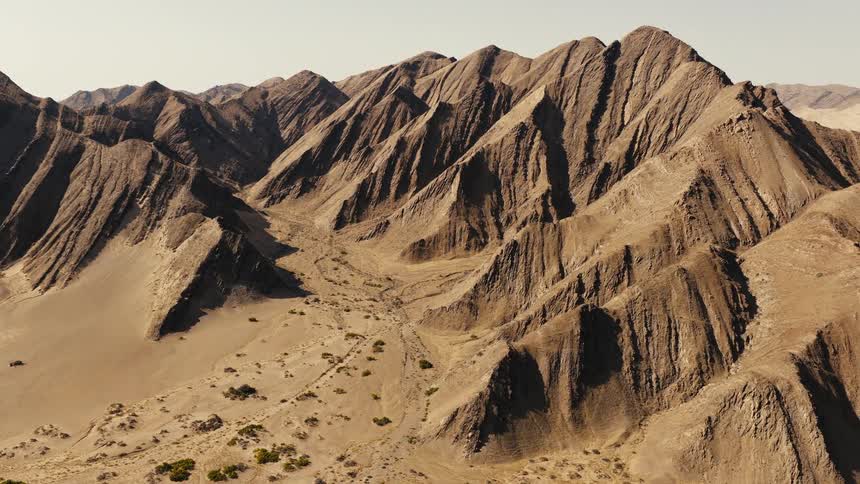 An aerial view of the desert and some mountains