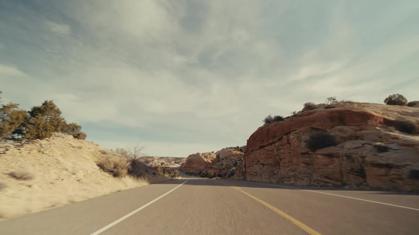 A view of a road through a rocky mountain area