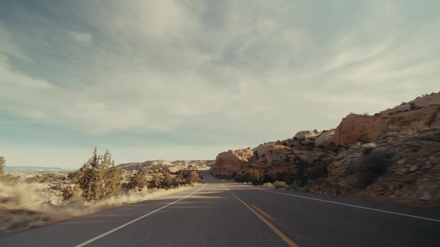 A view of a road through a rocky mountain area