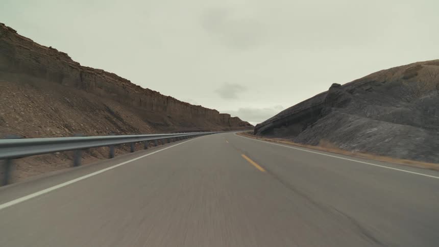 A view of a road running through a mountain
