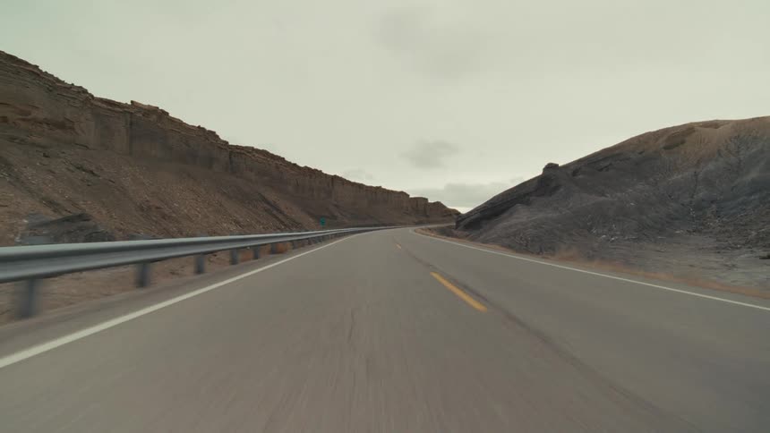 A view of a road running through a mountain