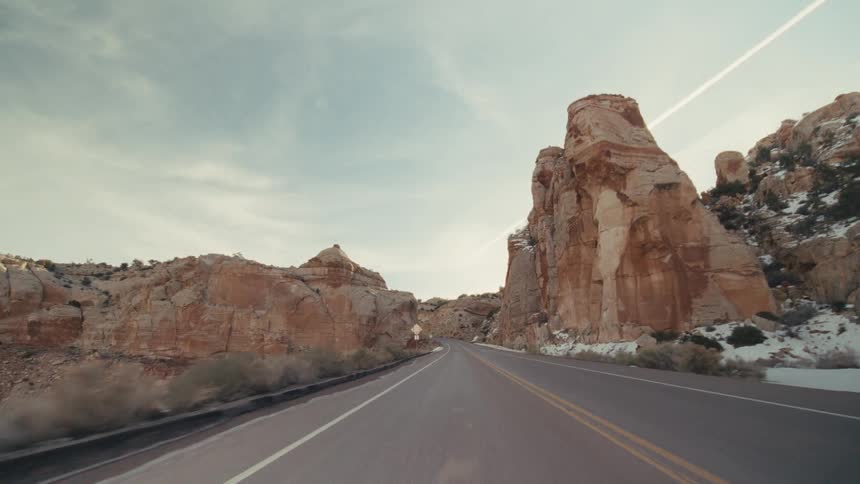 Road trip on a freeway through mountain canyons