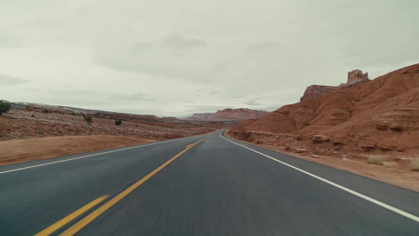 The highway stretches out into the canyon