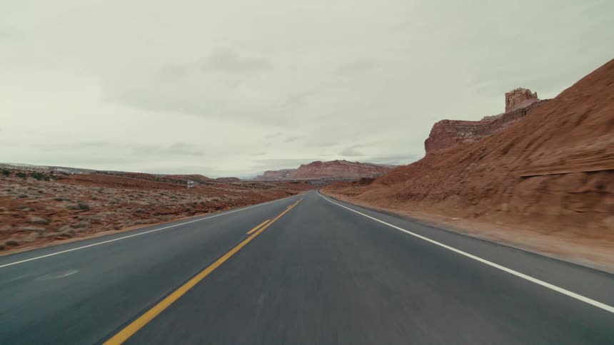 The highway stretches out into the canyon